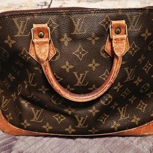 Louis Vuitton Alma Handbag